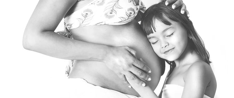 Schwangere_Mama_mit_Maedchen
